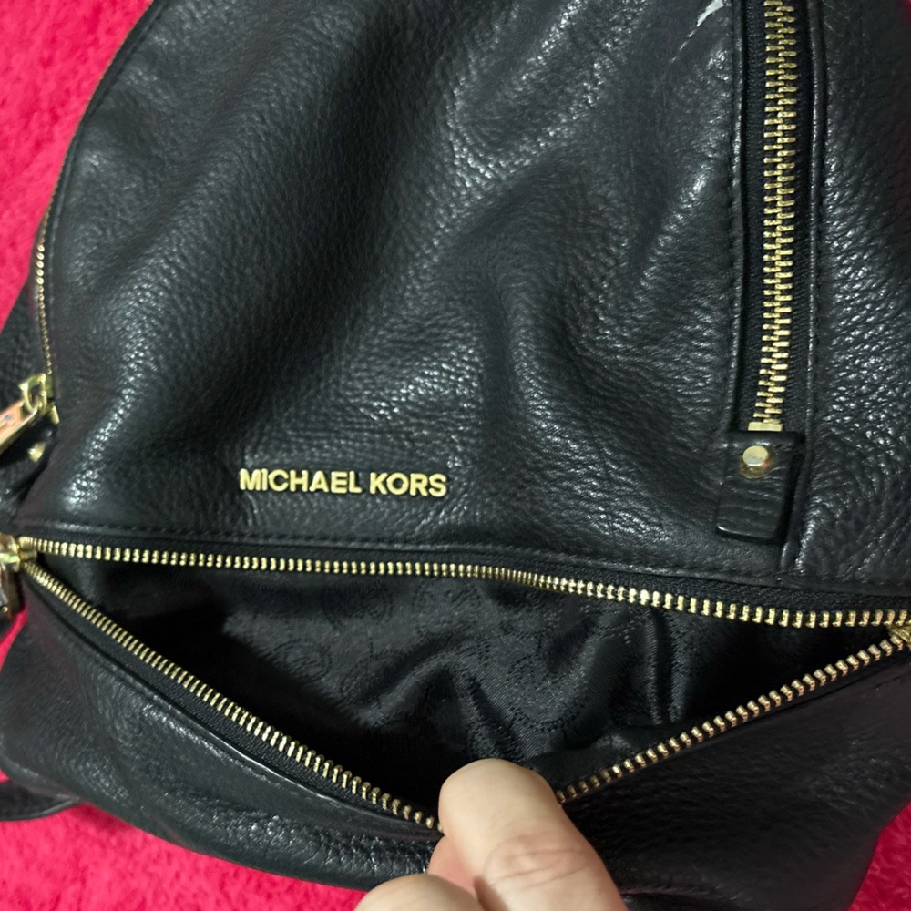 Michael Kors Black Leather Backpack with Gold Accents - Picture 6 of 10
